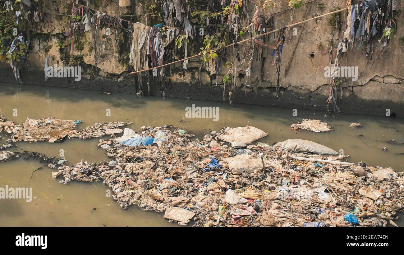 Dirty river in Dharavi slums. Mumbai. India. Stock Photo
