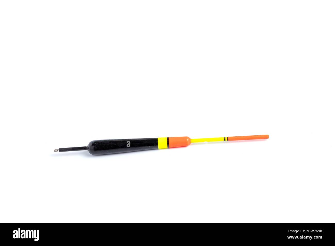 Two fishing bobbers on a white background, one orange and oblong and one  round and red and white in color Stock Photo - Alamy