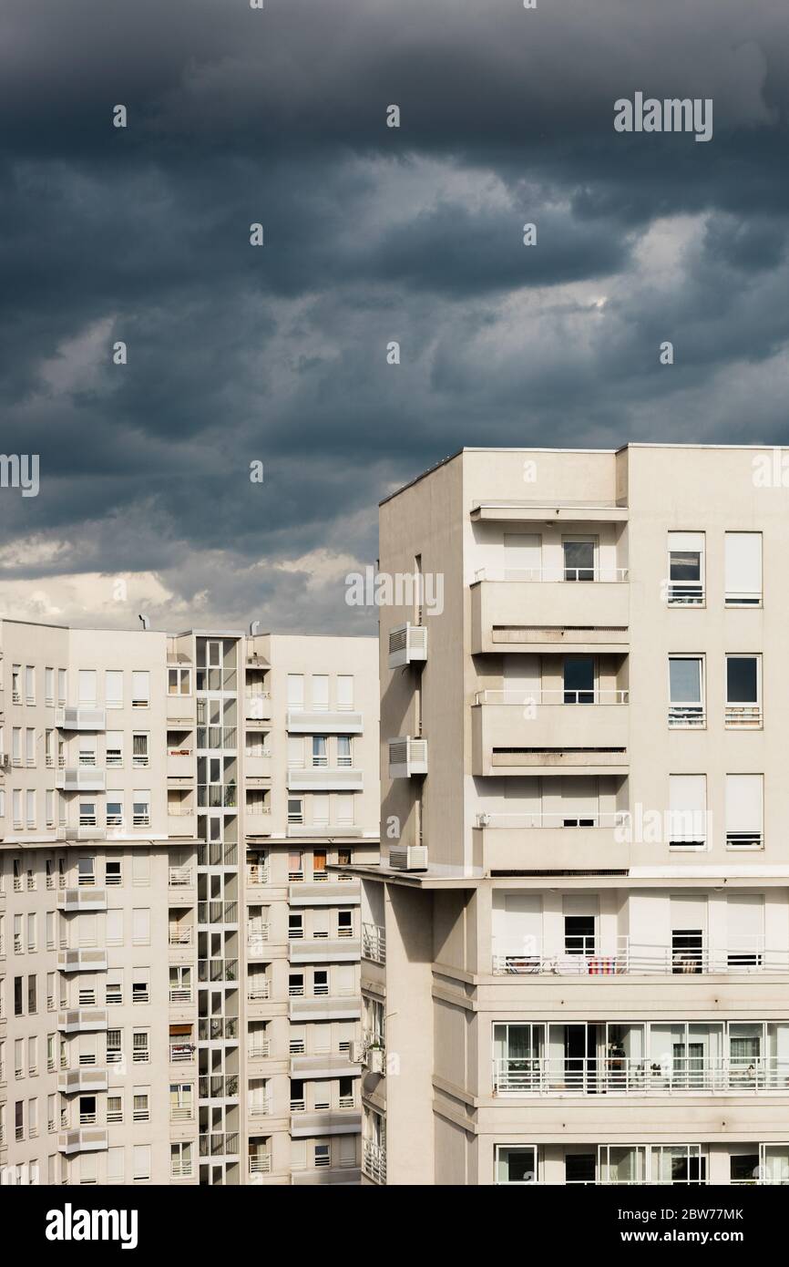 Stormy clouds over the residential buildings Stock Photo