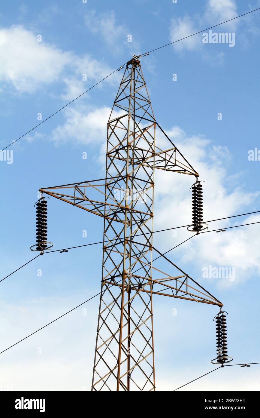 Power lines transmission line blue sky with clouds Stock Photo - Alamy