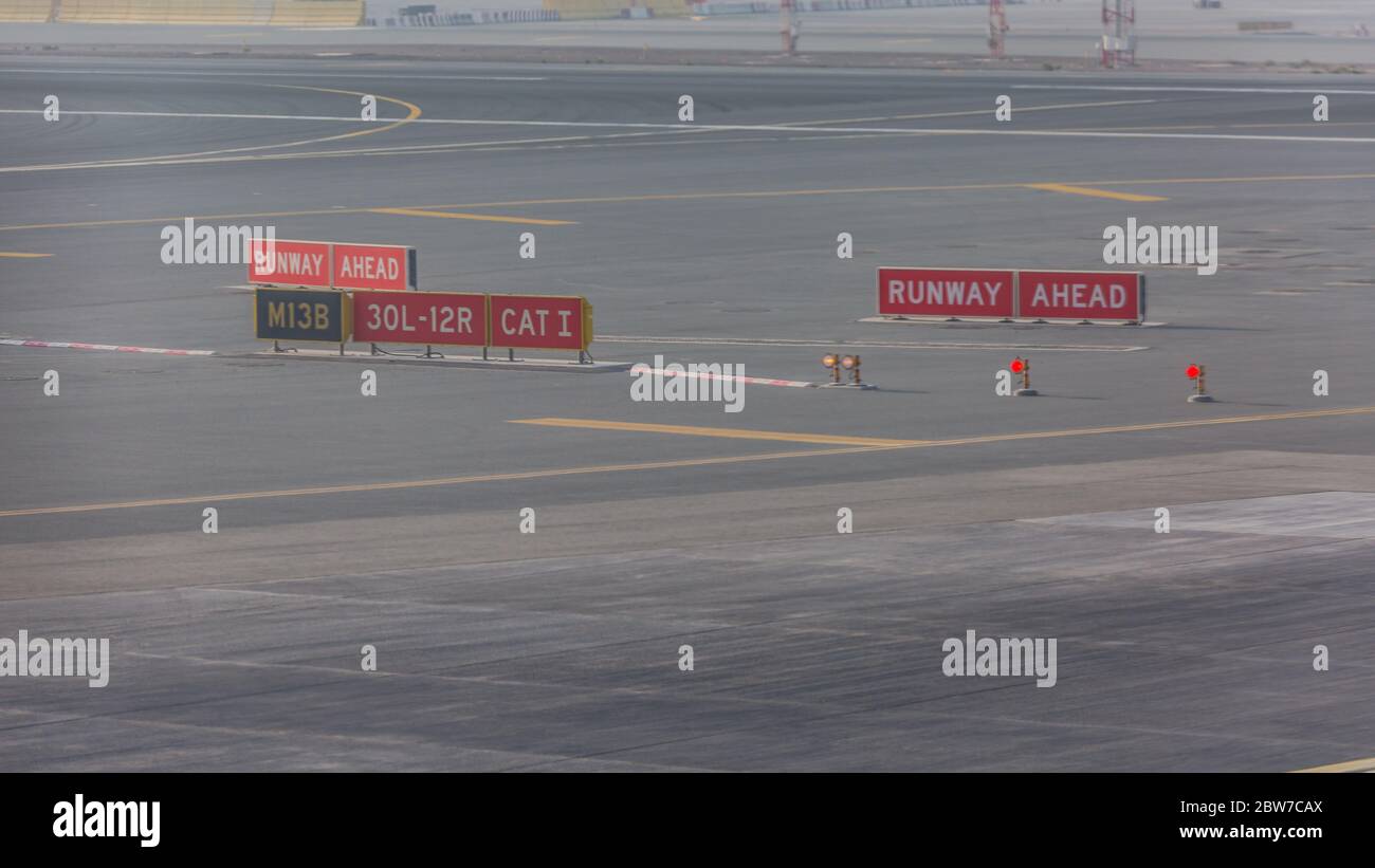 Airport taxiway sign. Sign markings on taxiway for direction at airport Stock Photo