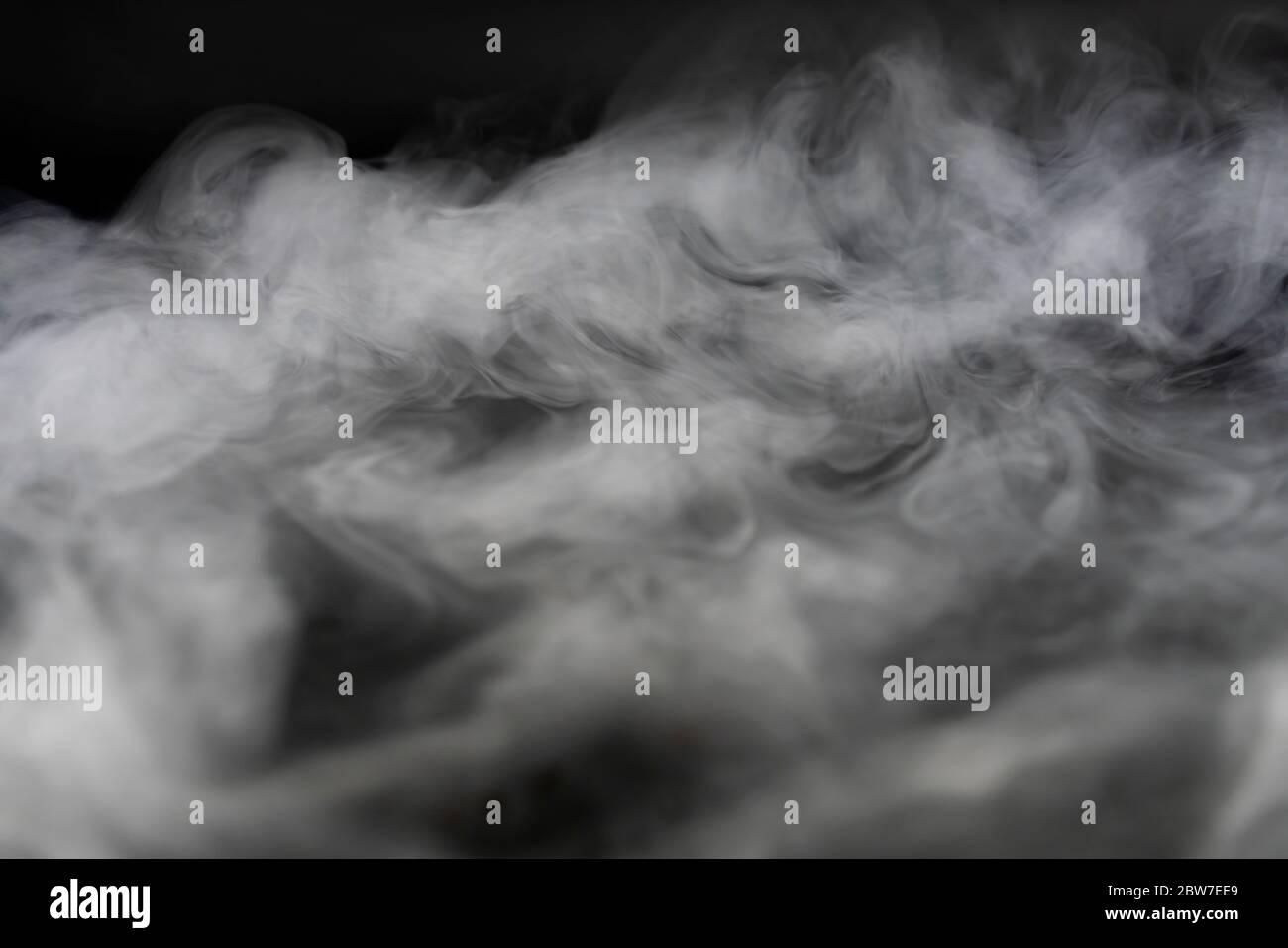Abstract Smoke In Dark Background Stock Photo