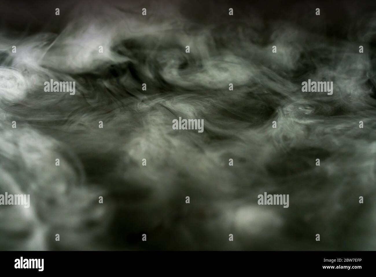 Abstract Smoke In Dark Background Stock Photo