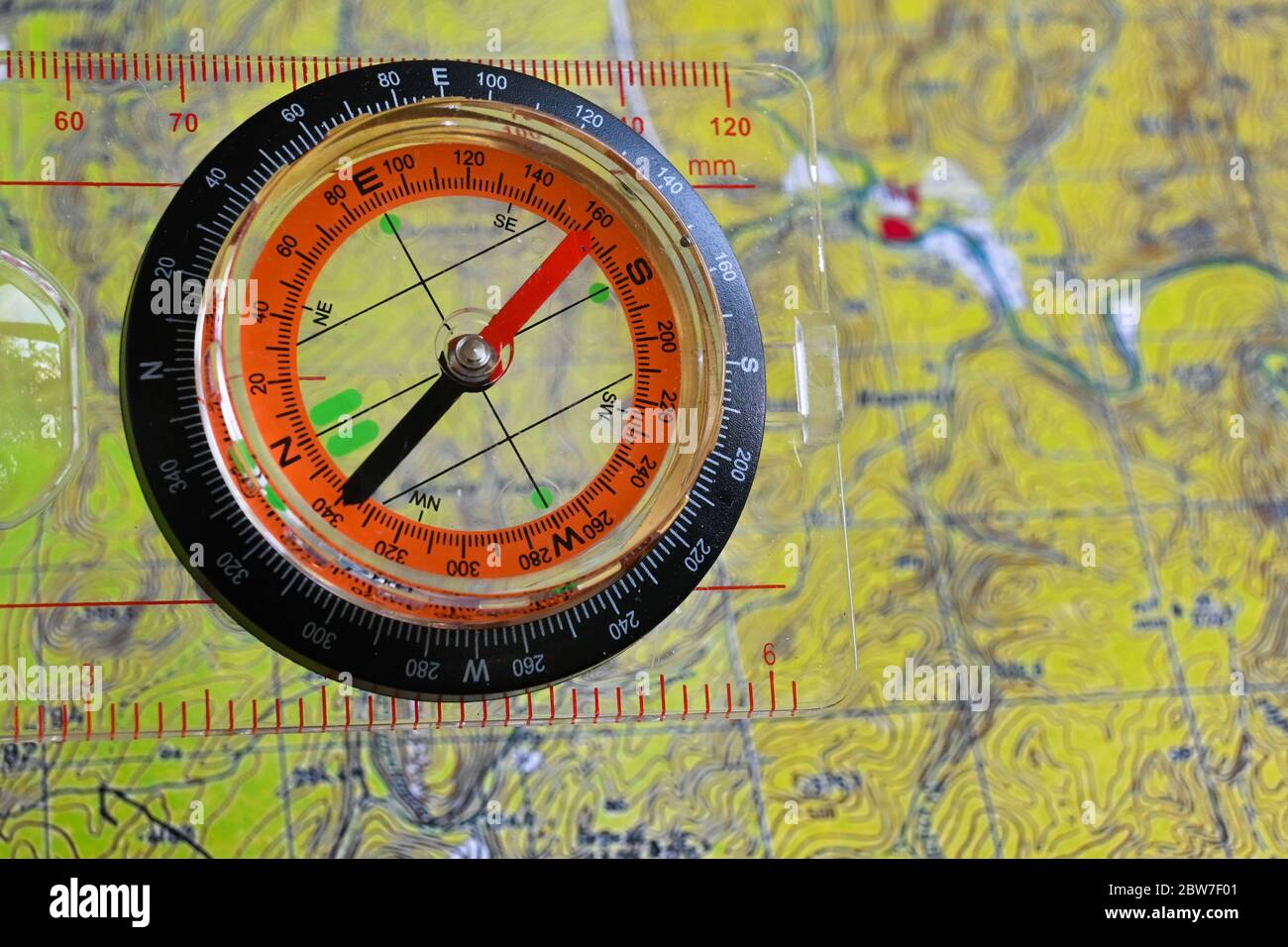 Orientation by map and compass. Symbols of expedition and travel in the ...