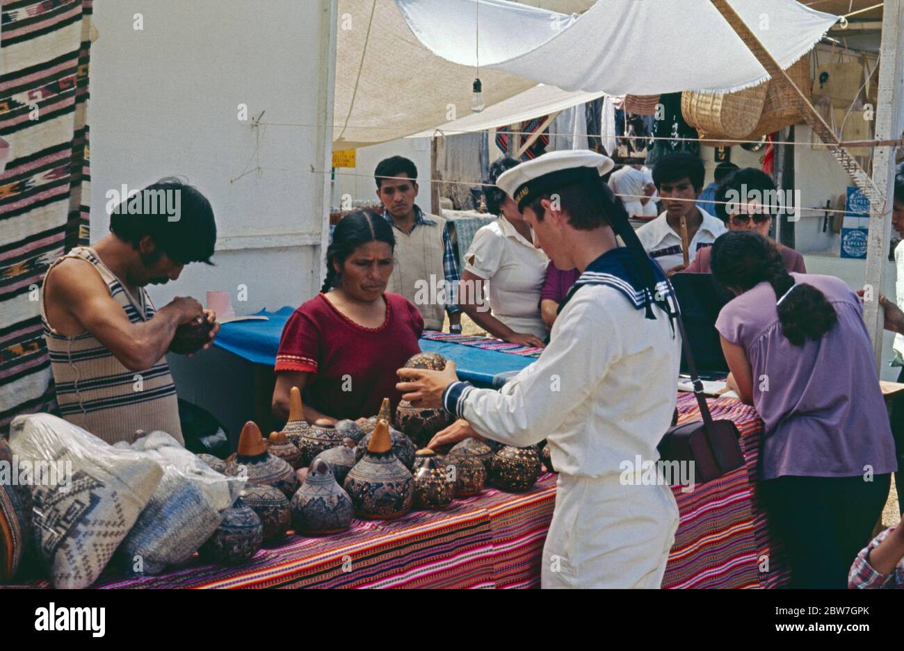 German sailor at an Indian Market, May 03, 1982, Miraflores, Lima, Peru, South America Stock Photo