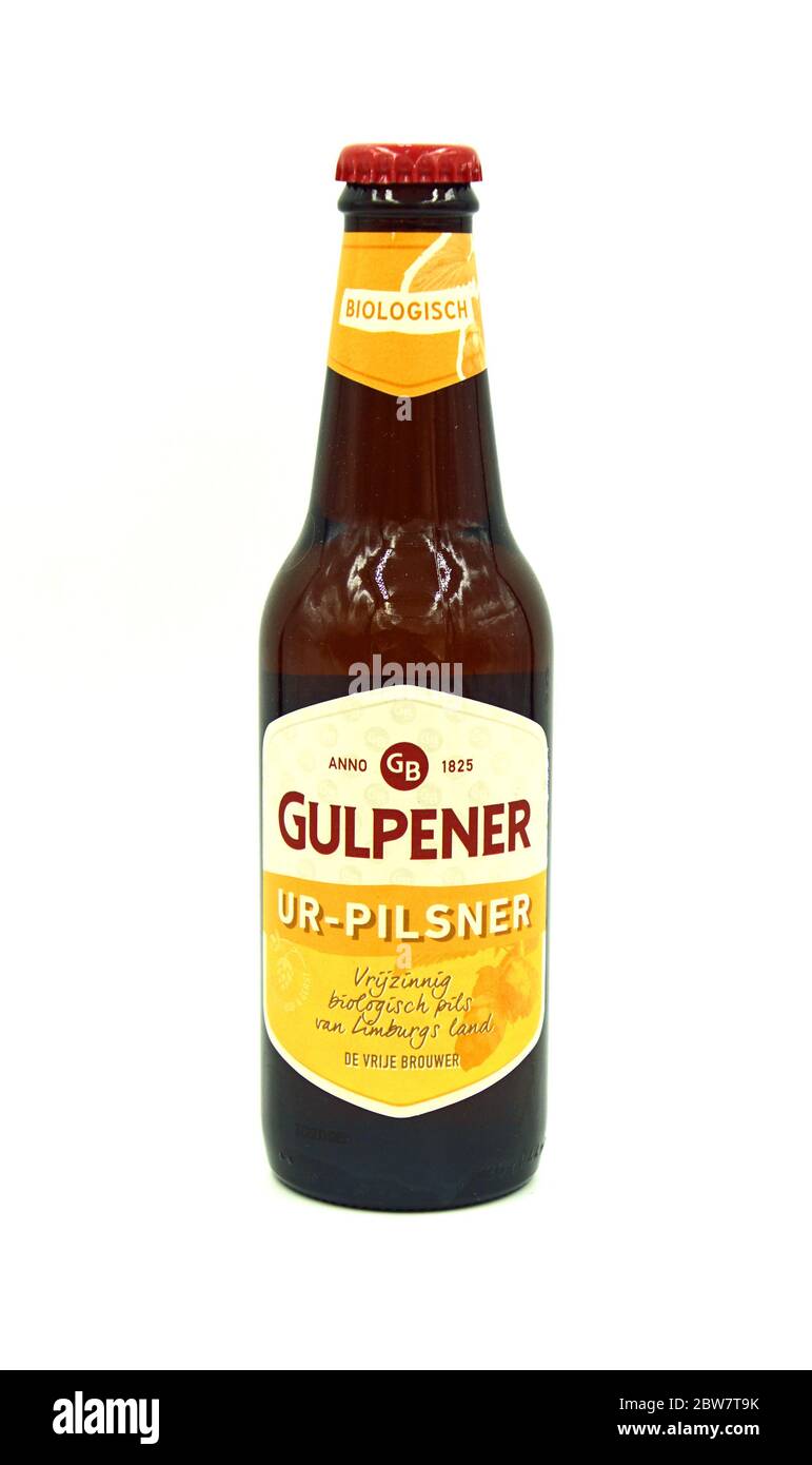 Gulpen, the Netherlands - May 29, 2020: Bottle of Gulpener  Ur-pilsner beer against a white background. Stock Photo