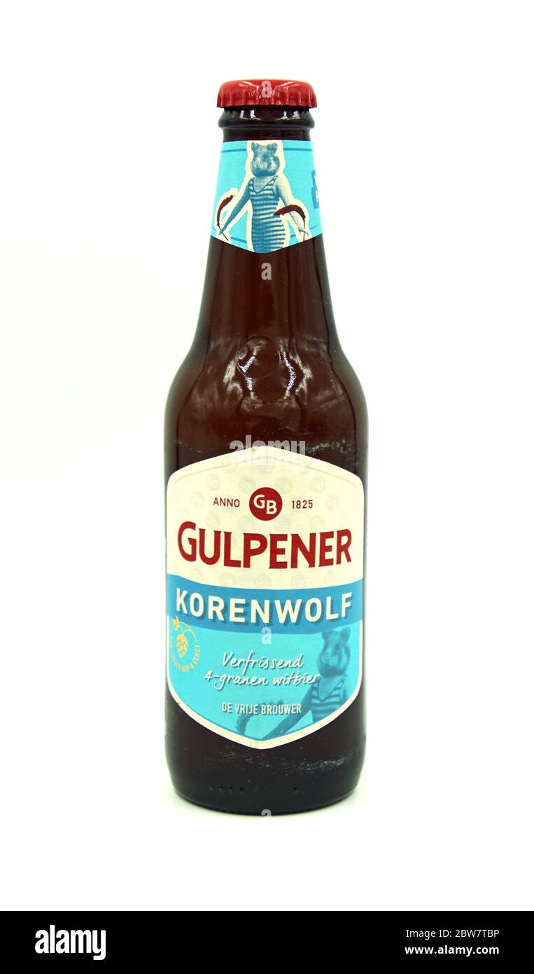 Gulpen, the Netherlands - May 29, 2020: Bottle of Gulpener Korenwolf beer against a white background. Stock Photo