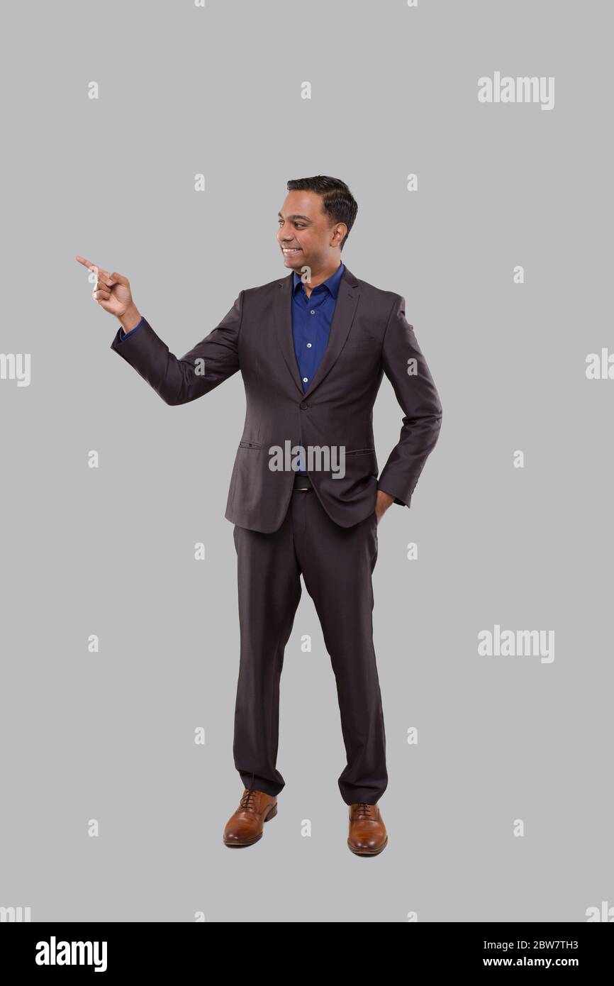 Indian man standing hi-res stock photography and images - Alamy
