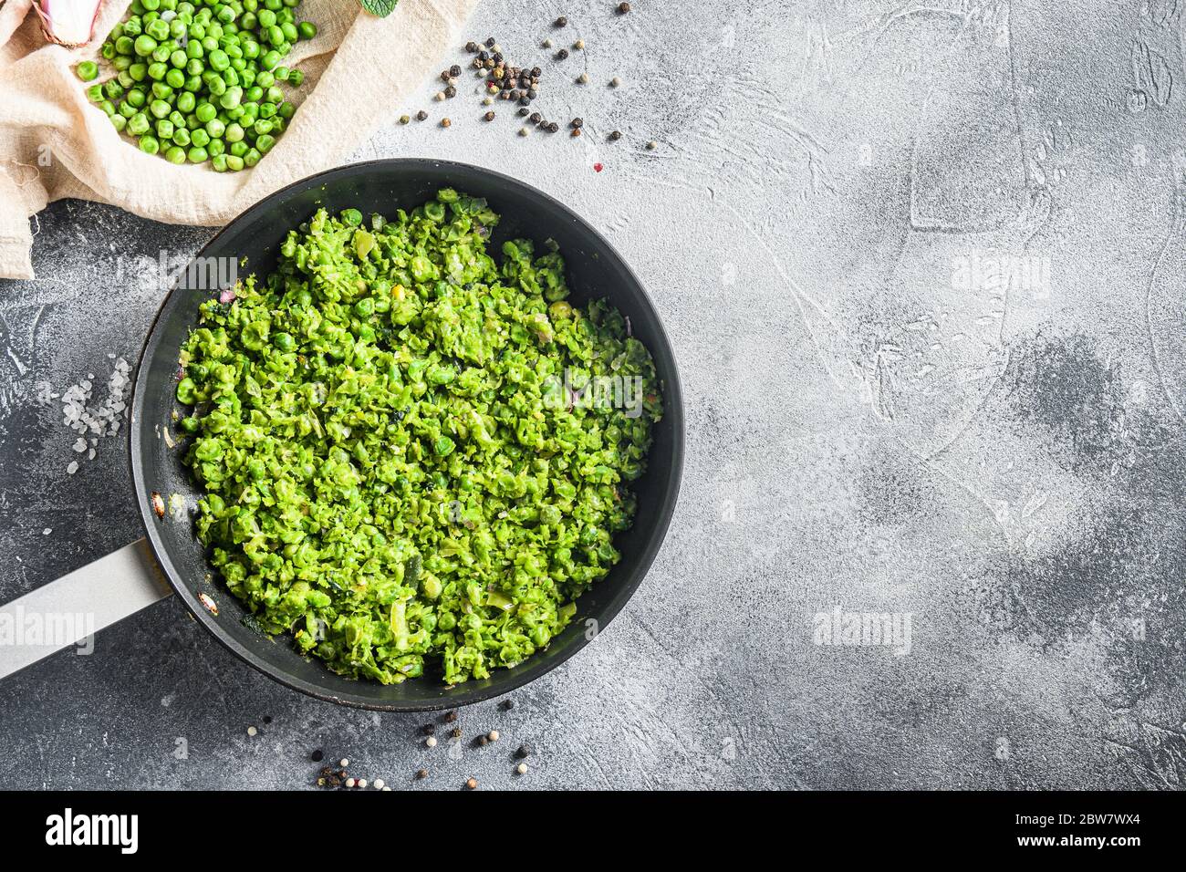 British Mushy Peas Cooked Frying Pan And Peas In Bowl With Mint Shallot Pepper And Salt Over Grey Stone Surface Organic Keto Food Overhead Photo Space Stock Photo Alamy
