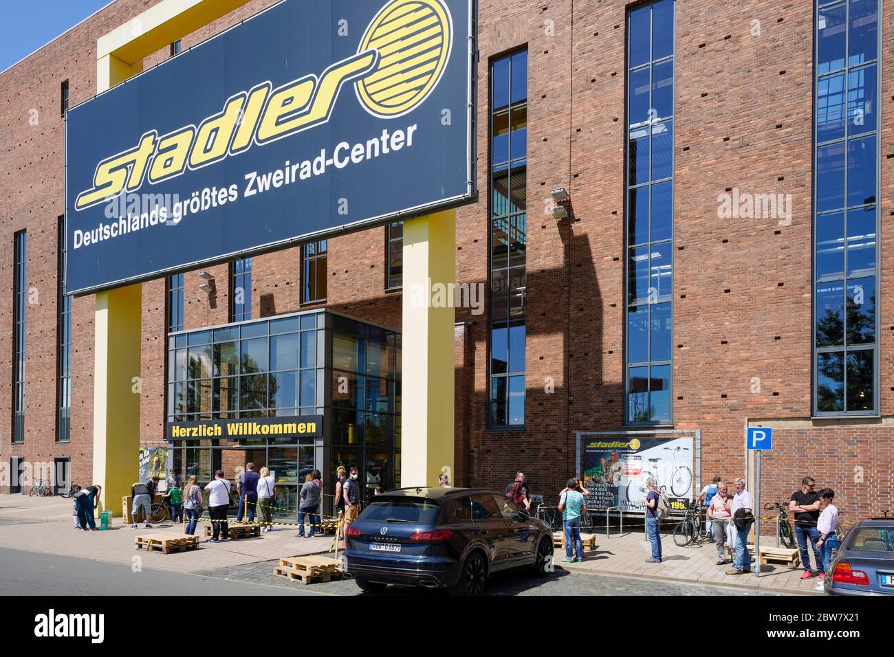 Hanover, Germany, May 30, 2020: Bicycle boom in the Corona crisis. Queues  in front of bicycle store Stadler, the largest bicycle center in Germany.  --- Hannover, 30.05.2020: Fahrradboom in der Corona-Krise. Warteschlangen