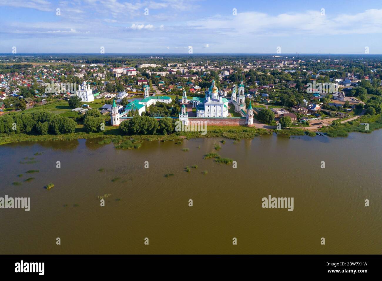 View of the Spaso-Yakovlevsky Dmitrovsky Monastery from the side of Nero lake on a sunny July day (aerial photography). Rostov, Golden Ring of Russia Stock Photo