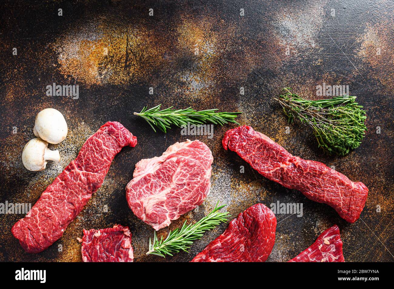 Organic set of raw alternative beef steaks flap flank Steak, machete