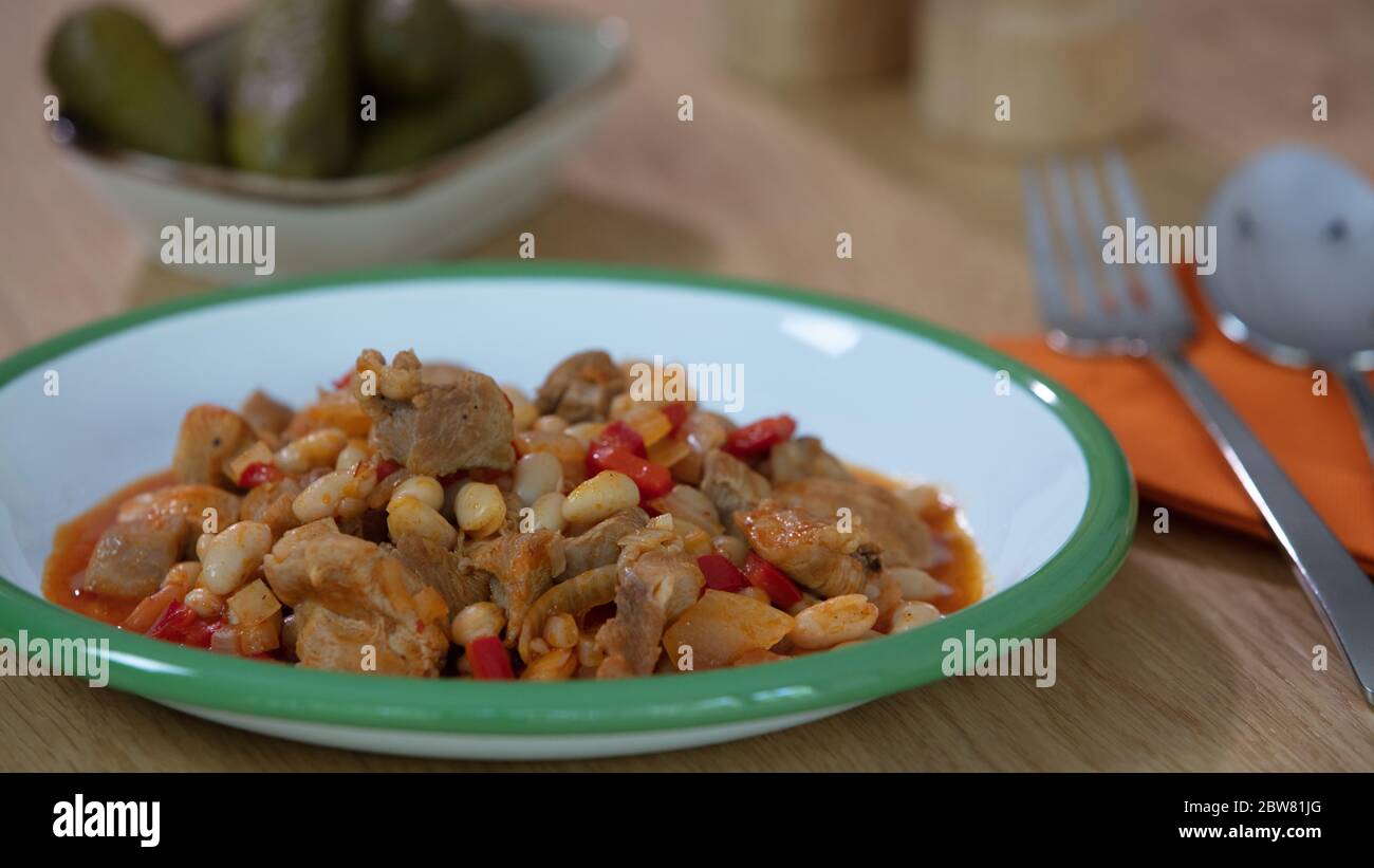 Hot turkish bean stew with a tasty tomato sauce, Turkish Food; Kuru Fasulye.. Stock Photo