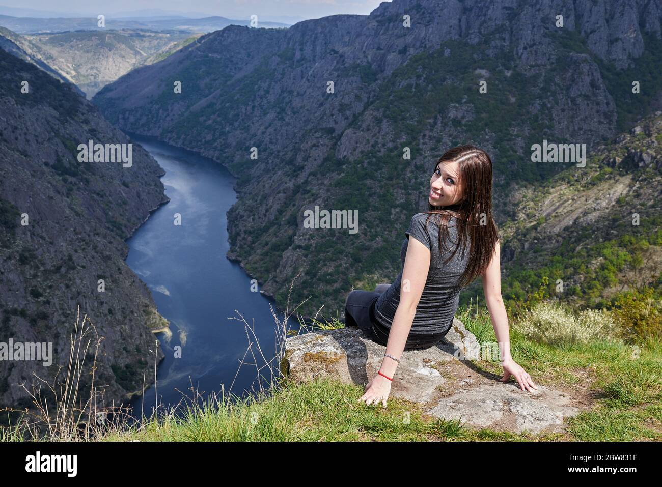 young woman contemplating Sil Canions from above Stock Photo