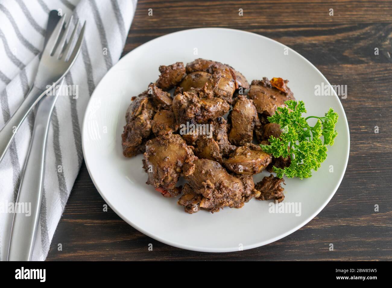 Fried Chicken Livers A plate of chicken livers fried with tomato and