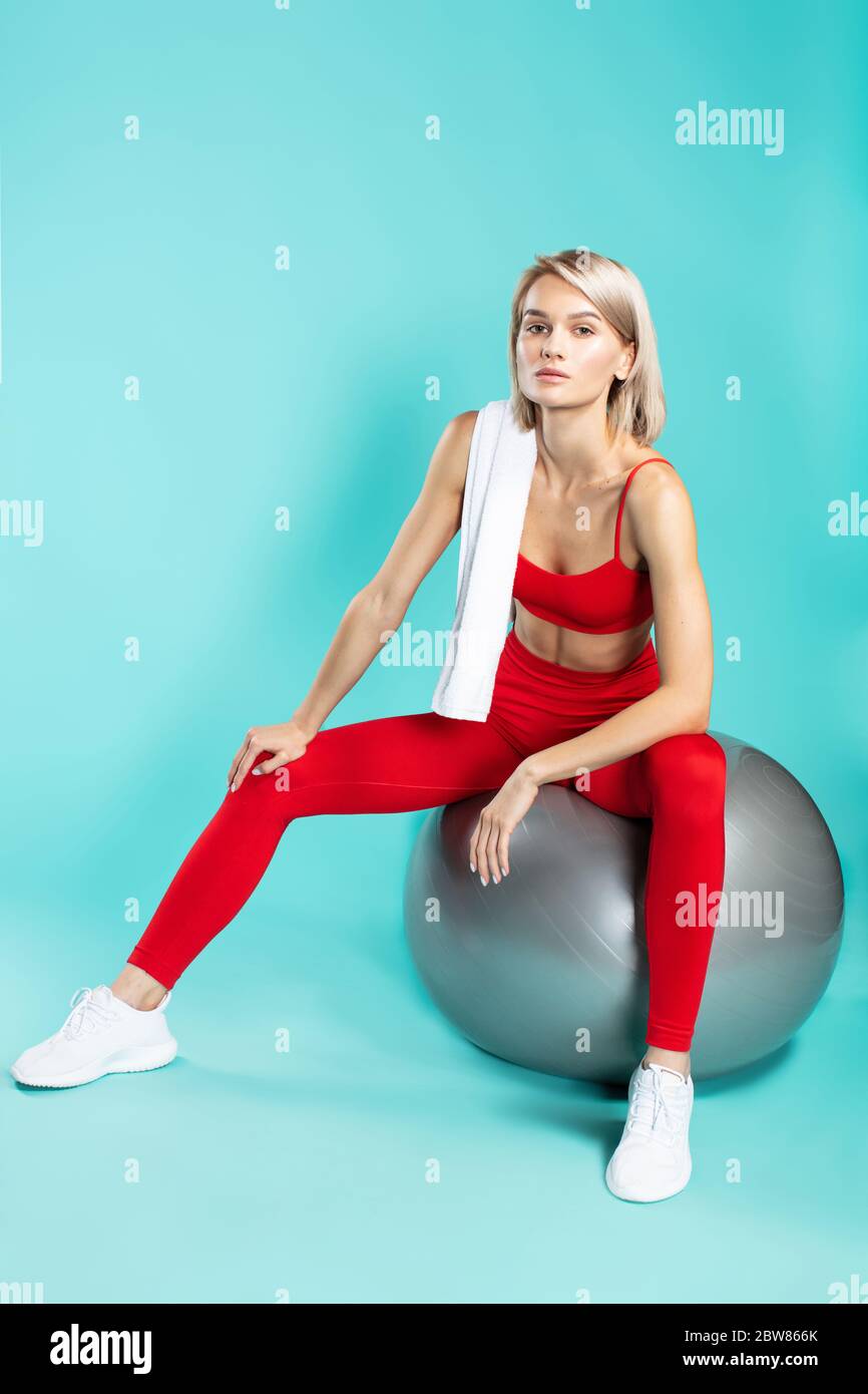 Woman red exercise ball hi-res stock photography and images - Page 3 - Alamy