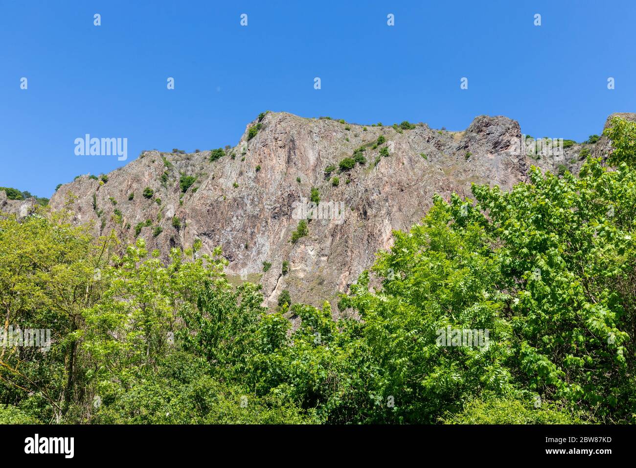 Scenic view of the rock massif Rotenfels nearby Bad Muenster am Stein Ebernburg at Nahe River Stock Photo