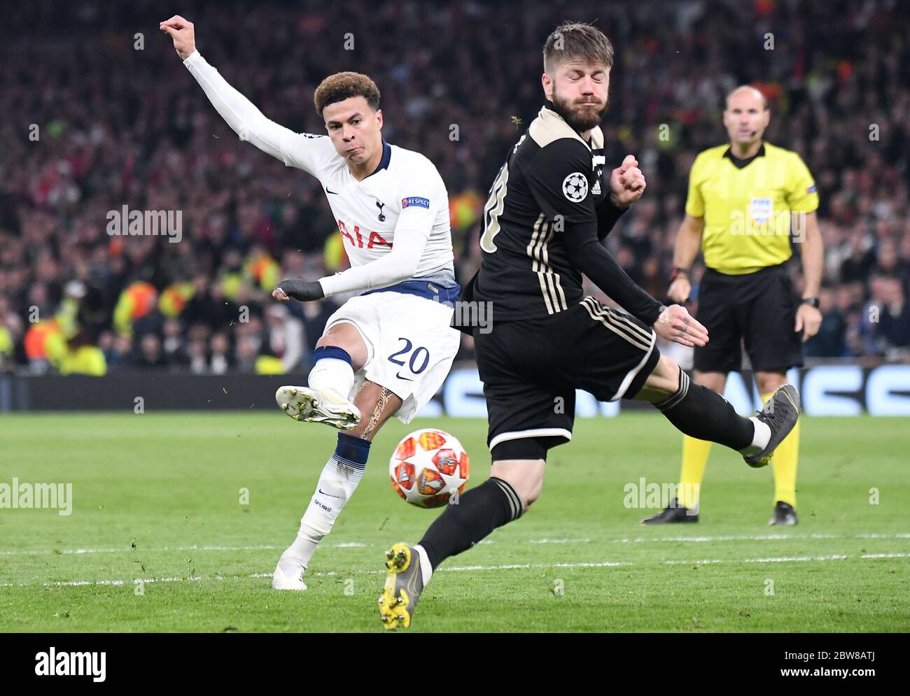 LONDON, ENGLAND - APRIL 30, 2019: Dele Alli of Tottenham (L) and Lasse Schone of Ajax (R) pictured during the first leg of the 2018/19 UEFA Champions League Semi-finals game between Tottenham Hotspur (England) and AFC Ajax (Netherlands) at Tottenham Hotspur Stadium. Stock Photo