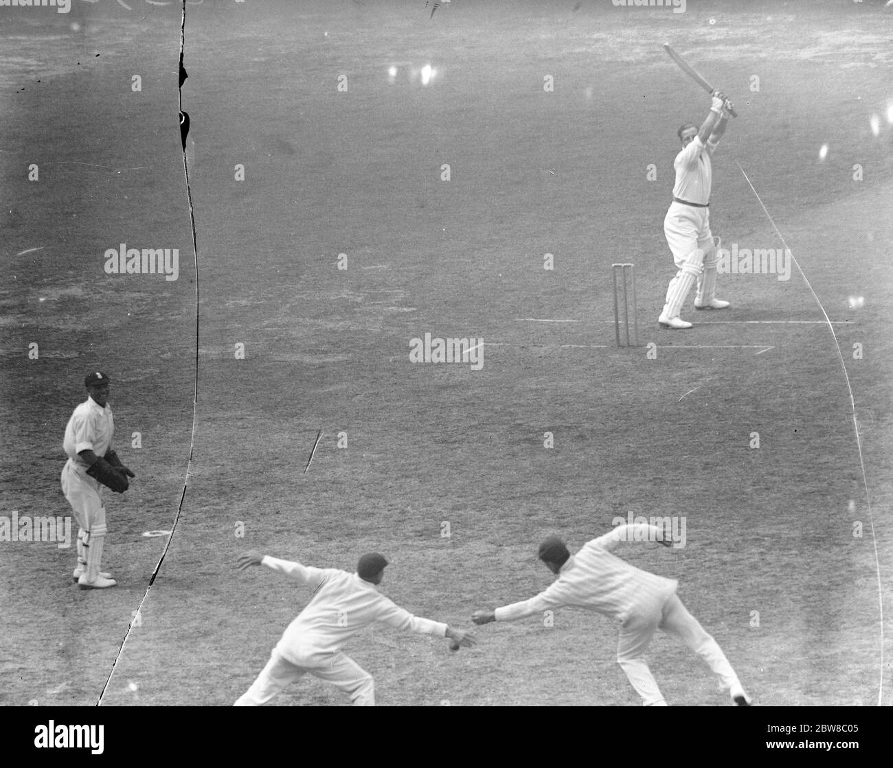 Gentlemen versus Players at the Oval . With wickets falling cheaply , the Hon Lionel Tennyson hit out fearlessly for the Gentlemen against the Players . In the picture a frantic but futile effort to catch him out is seen being made in the slips . 9 July 1925 Stock Photo
