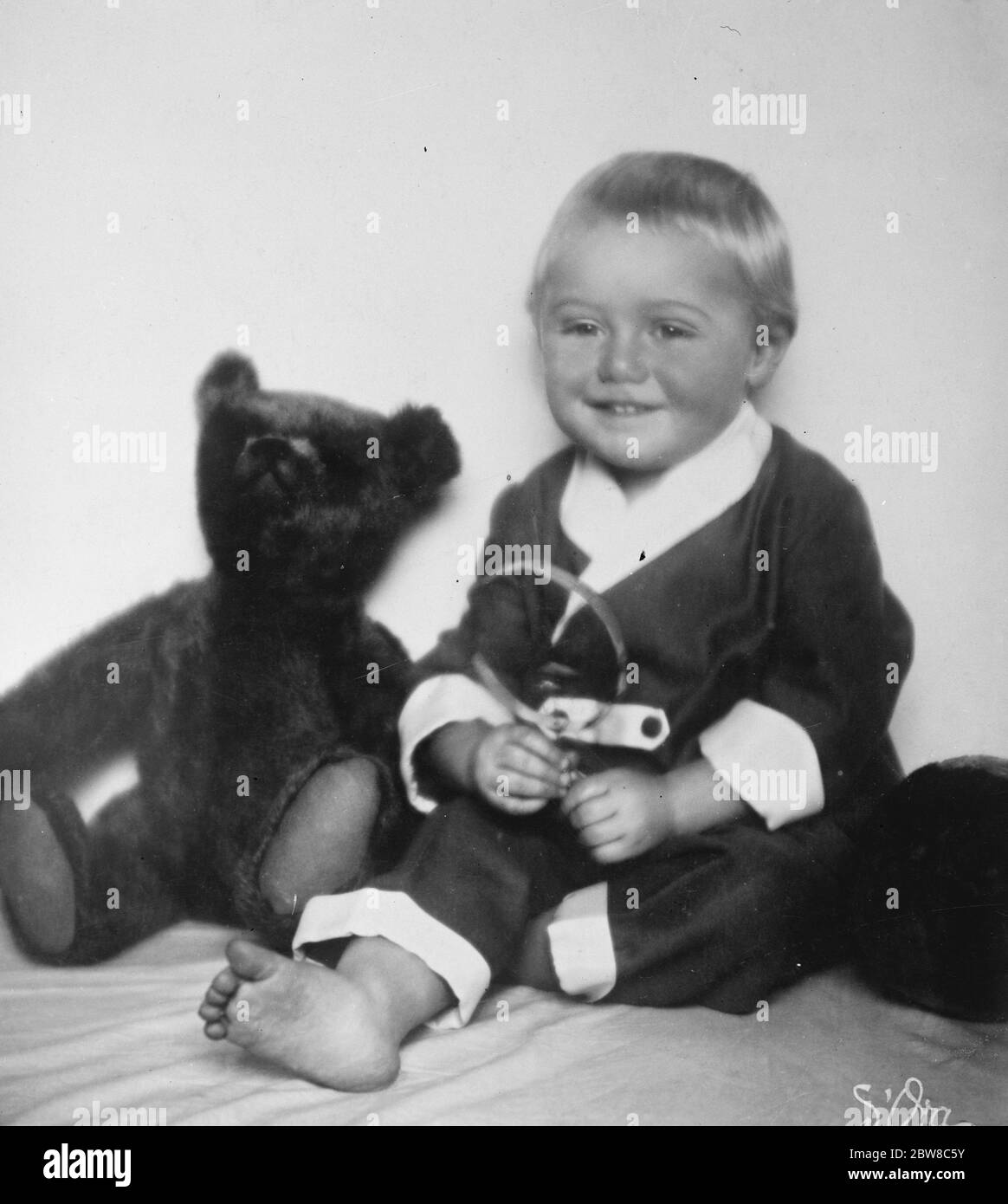 Smile which brought a fortune . Timon Berczelly , the three year old foundling who has just been adopted by the Baroness Takasy , Hungary 's wealthiest woman , who has nominated him as her sole heir . 25 February 1927 Stock Photo