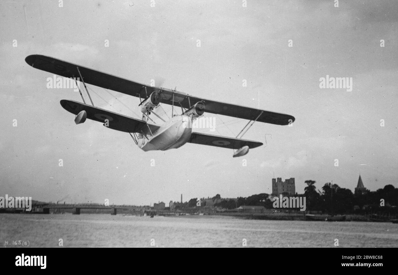 All metal air liners to link the Empire : huge British machine makes a successful Baltic cruise .  Singapore  in flight . 13 September 1927 Stock Photo