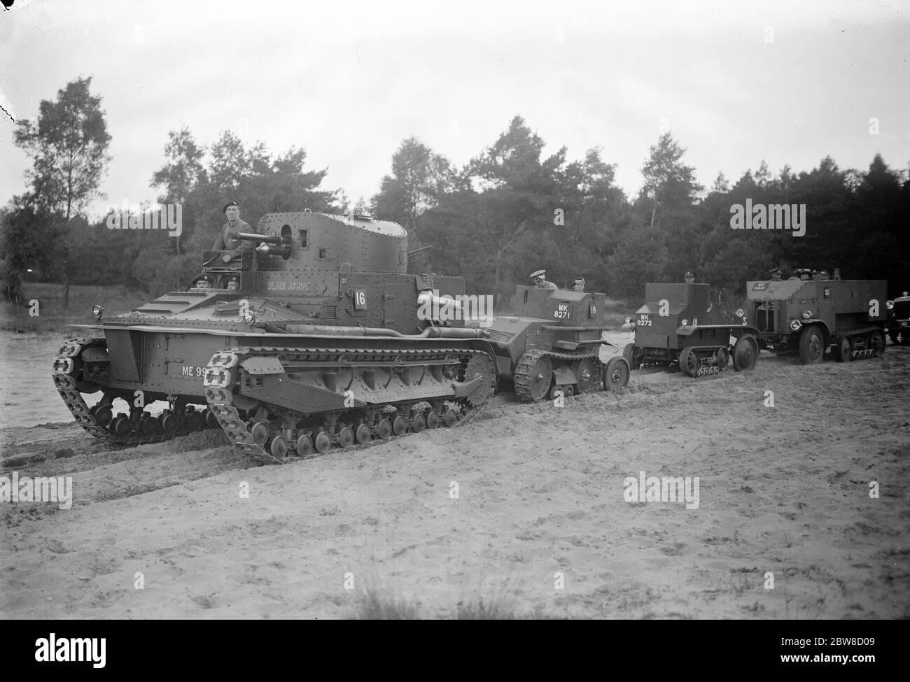 Colonial office conference visitors see war office demonstration of transport cross country vehicles at Aldershot . One of the largest tanks with a one man and two man tank . 21 May 1927 Stock Photo