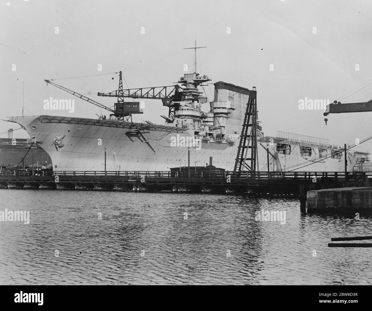 America ' s naval development . Another queer sea monster . the USS Lexington , photographed in the Fore River Ship Yards , Quincy , Mass . 23 December 1927 Stock Photo