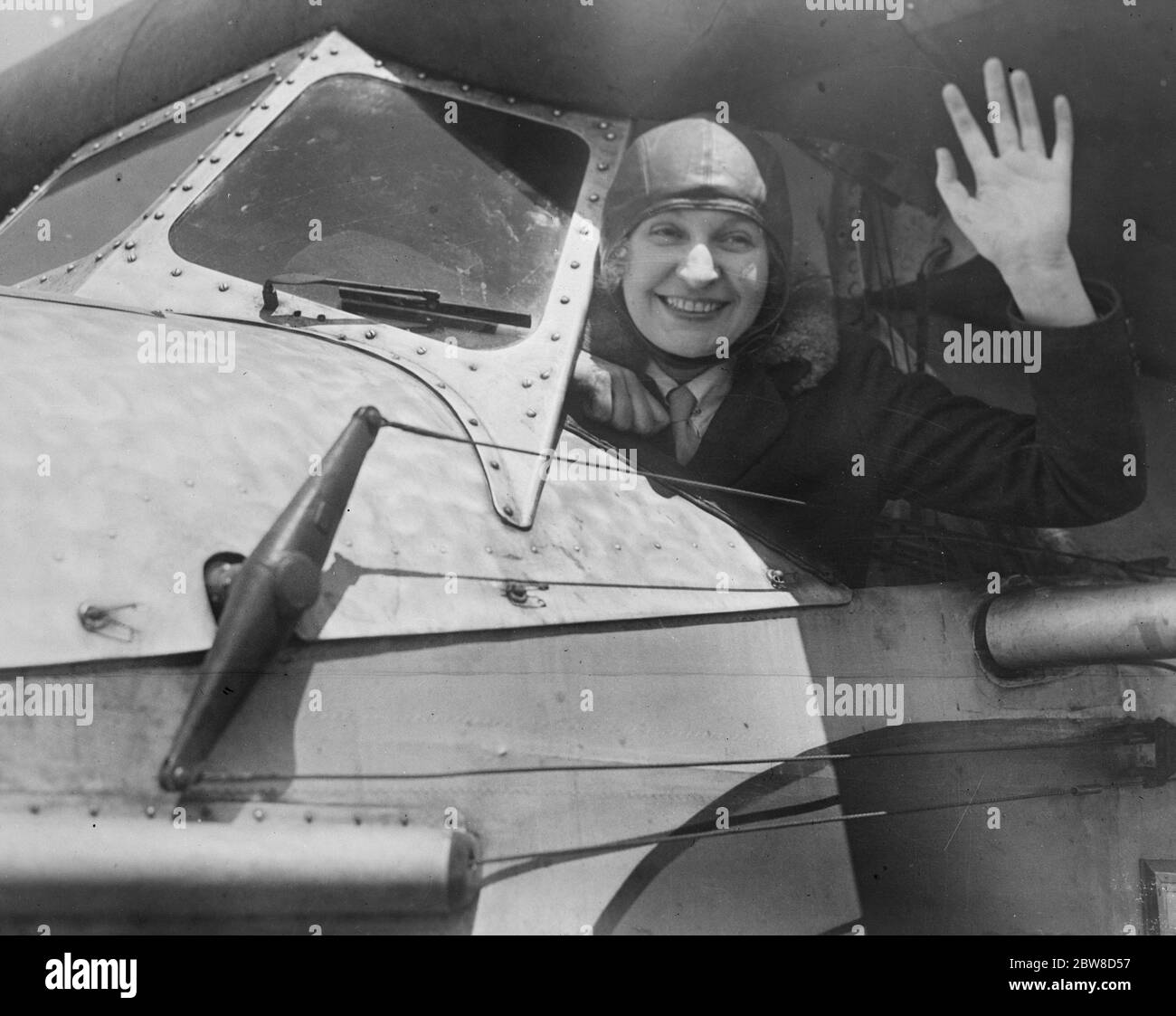 Luba Phillipps in the cockpit of the Tri engined Fokker Plane in which she and several passengers flew over Roosevelt Field recently . July 1927 Stock Photo