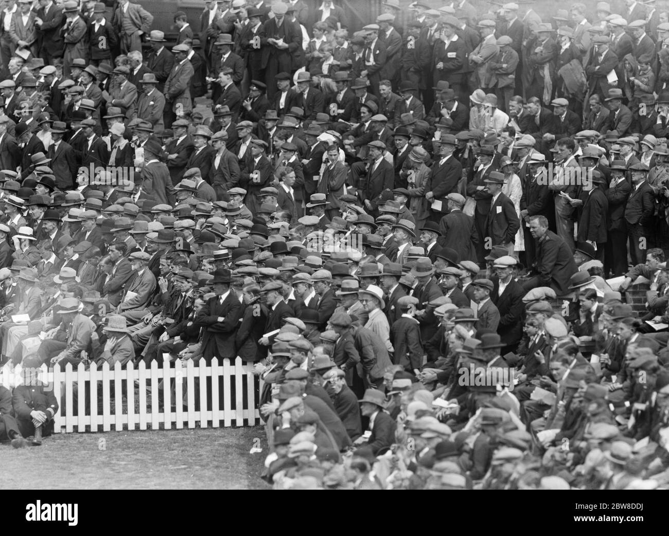 Cricket at the Oval , Surrey versus Kent in the County Championship . Part of the crowd watching the game with interest . 28 July 1928 Stock Photo