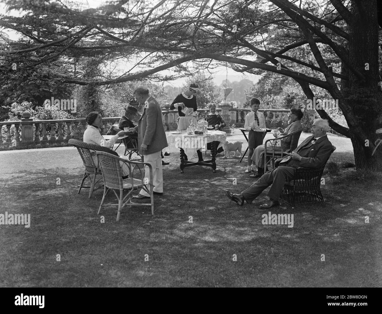 Afternoon tea in the gardens of Oakhill . 1928 Stock Photo