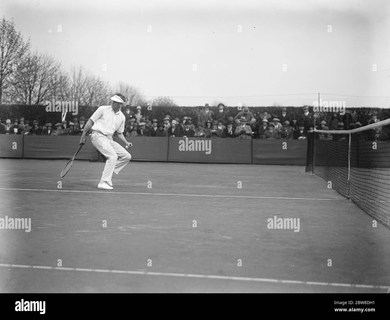 Surrey Hard Court tournament at Roehampton . S M Jacob in play . 16 April 1927 Stock Photo