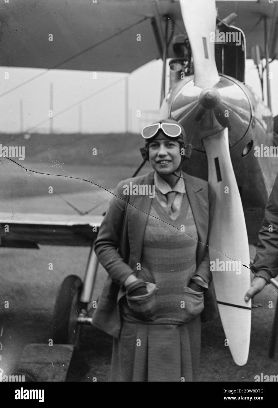 Captain Lancaster and Mrs Miller start on flight to Australia . Mrs Miller in front of the machine just before starting at Croydon . 14 October 1927 Stock Photo