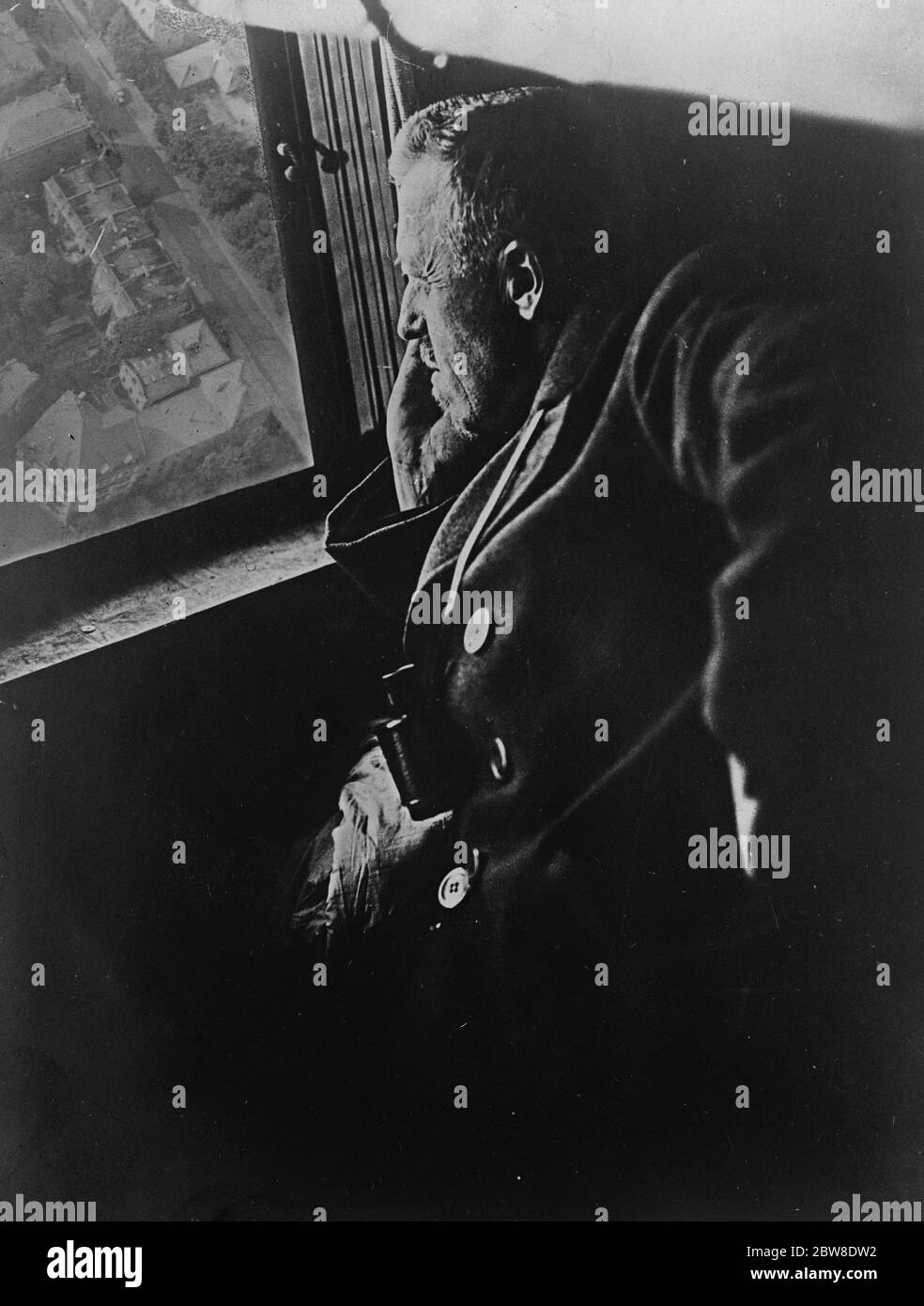 At the window of the new zeppelin . Dr Hugo Eckener , the constructor of the great new zeppelin , at the window of the control cabin . 27 September 1928 Stock Photo