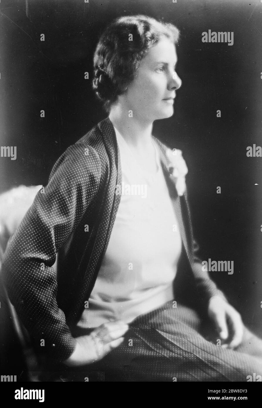 The Premier ' s daughter in profile . A beautiful and graceful portrait study of Miss Ishbel MacDonald , daughter of the Premier of Great Britain , taken at the British Embassy at Washington early today . 5 October 1929 Stock Photo