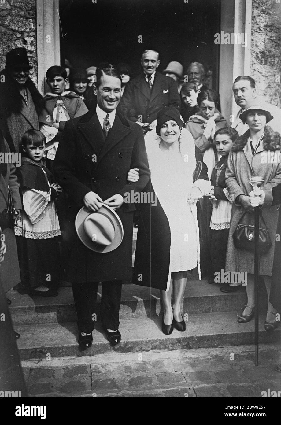 The well known Paris music hall entertainers , M Maurice Chevalier and Mlle Yvonne Vallee , who recently appeared in ' White Birds ' , were married in the Paris suburb of Vaucresson . Bride and bridegroom . 12 October 1927 Stock Photo
