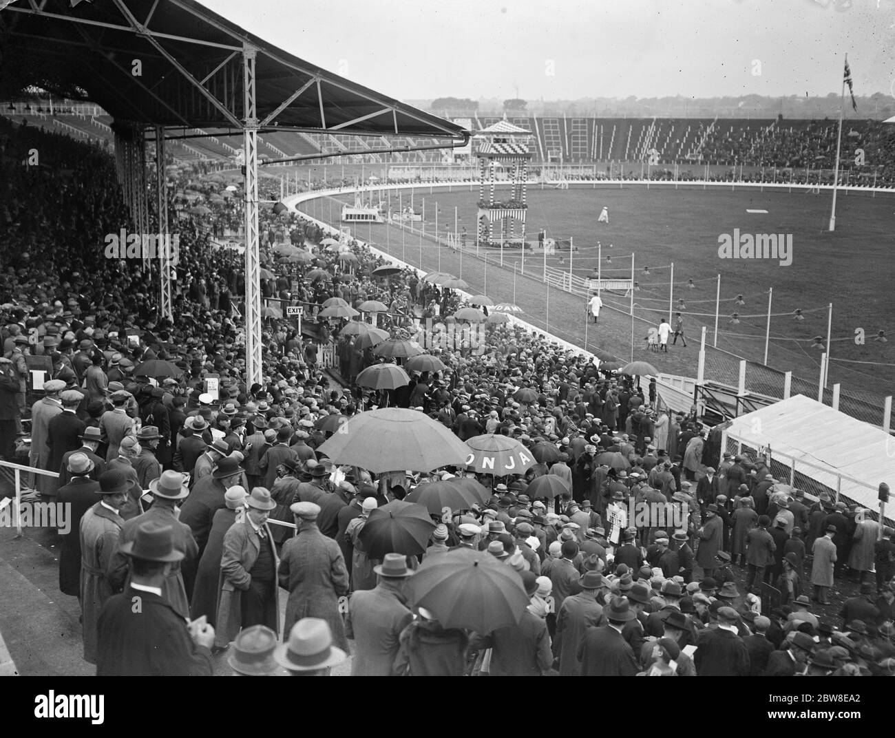 Greyhound race meeting at the White City . A portion of the crowd ...