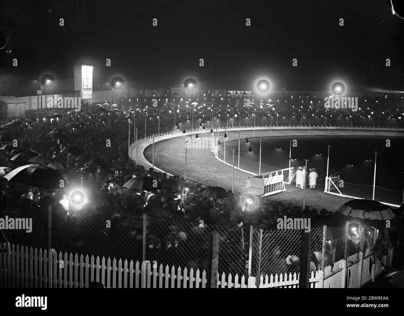 London 's new greyhound racing track opens at Harringay . A general view of the scene on the track on the opening night which was marred by rain . The judge 's box is in the centre of the picture . 15 September 1927 Stock Photo