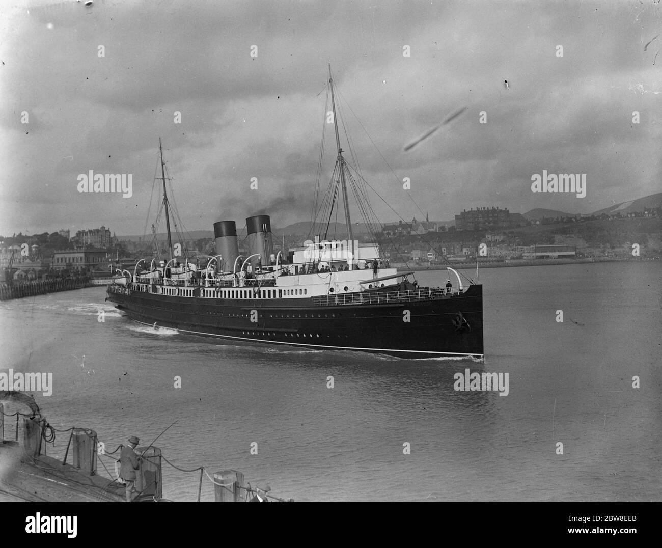 The  SS Biarritz  leaving Folkestone Harbour . 1929 Stock Photo
