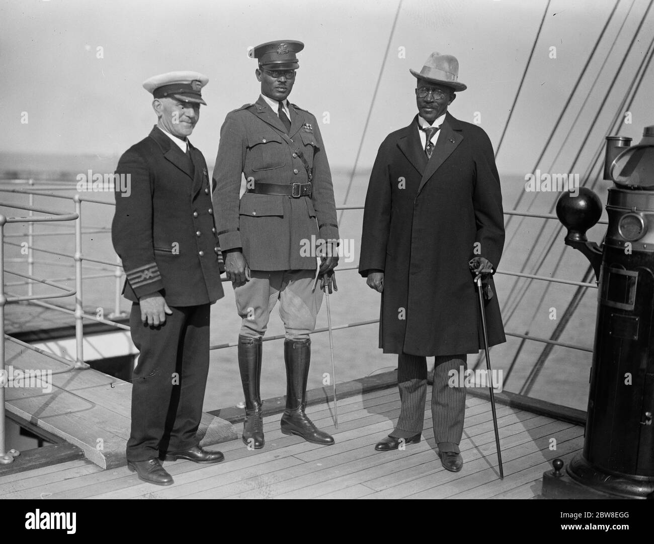 President of Liberia arrives at Dover . The President of Liberia , Dr CDB King , with Lt Colonel Elwood Davis ( Dr King 's ADC ) and Captain Carey , of the  Maid of Kent  , on the bridge on their arrival at Dover . 19 July 1927 Stock Photo