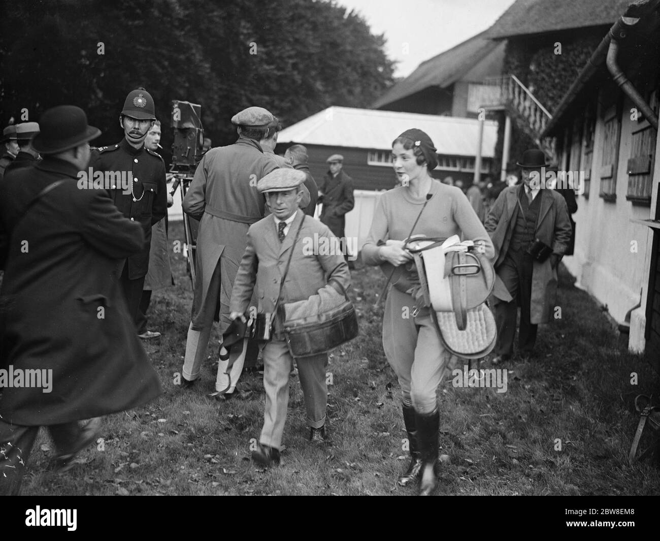 Women jockey 's in Historic town plate . Miss Madden , daughter of Otto Madden , the famous jockey , one of the riders with her father at Newmarket . 13 October 1932 Stock Photo