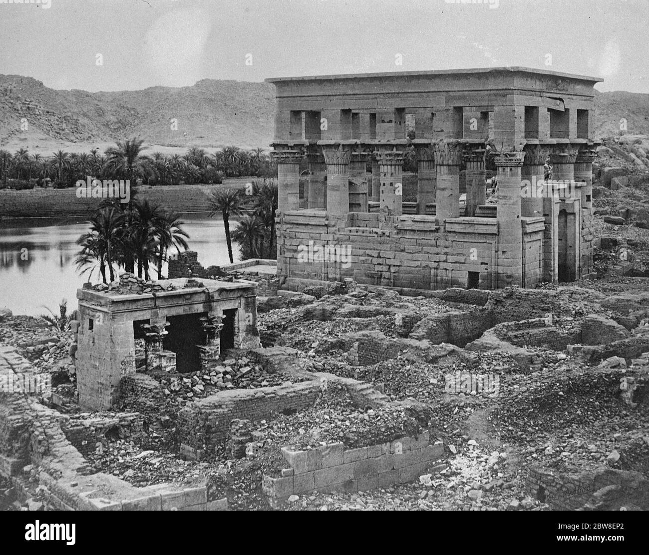 The temple of Philae to be moved . Rising Nile waters causing Depredations . A view of Philae showing the Kiosk called Pharoah ' s bed with small chapel . 21 February 1929 Stock Photo