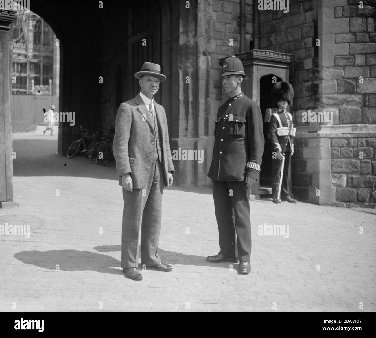 In plain clothes is Inspector Ackerman in charge of Police at Windsor Castle . 1930 Stock Photo