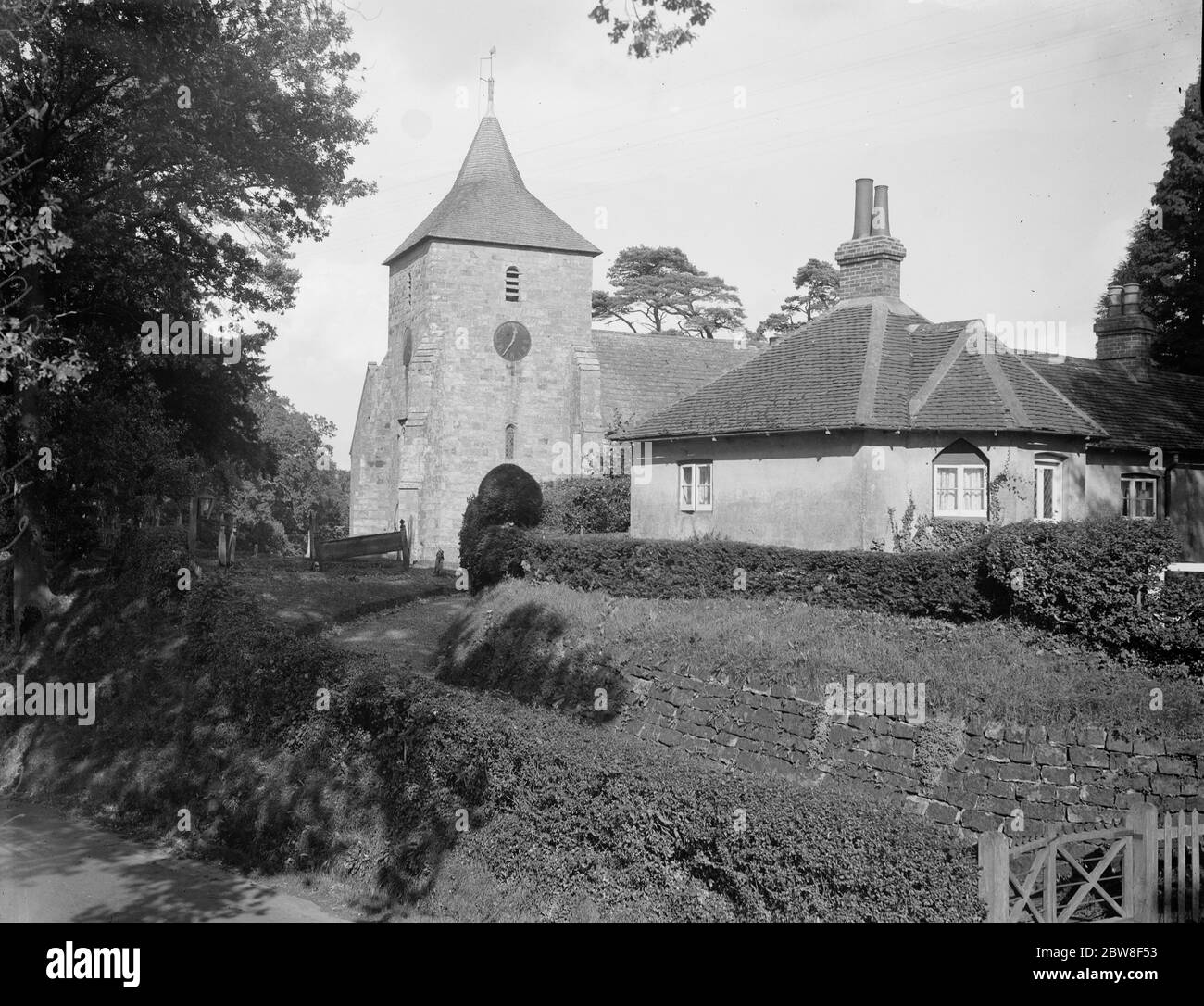 The church in the pretty village of Balcombe in Sussex . 8 October 1931 Stock Photo