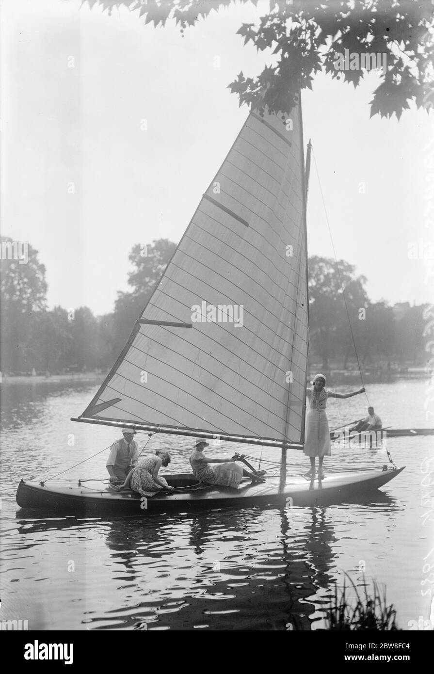 Sailing thrills in the Heart of London . Small sailing yachts have just been installed to add to the pleasures of Londoners on the lake , with its picturesque surroundings , in Regents Park . 18 August 1932 Stock Photo