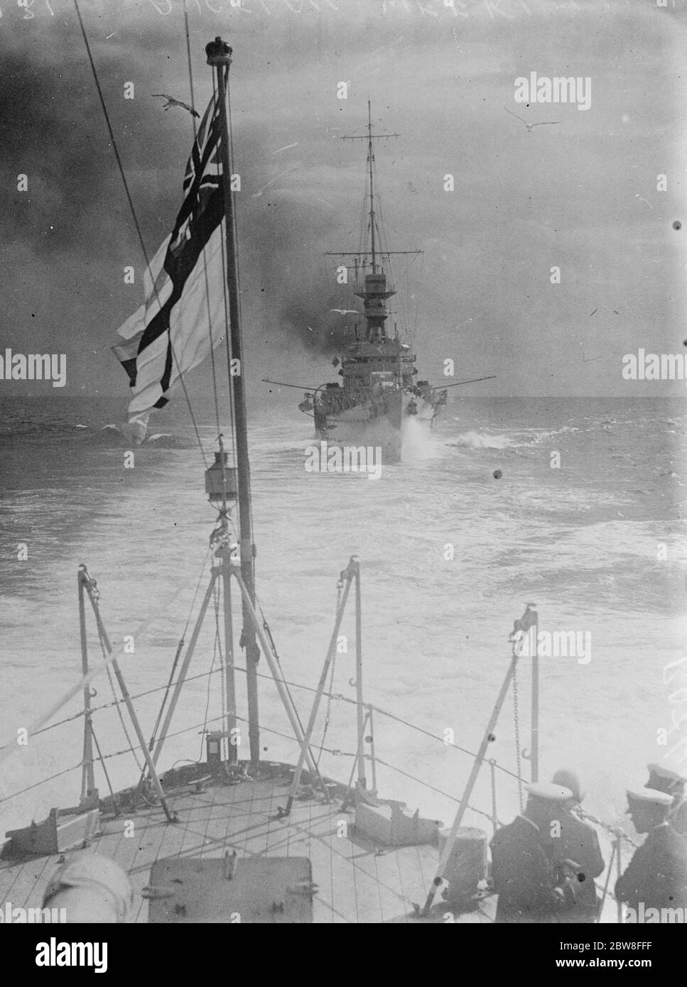 The navy 's work at Hawkes Bay . A unique photograph secured from the stern of the warship HMS Dunedin showing the HMS Dionede travelling full speed to the scene of the disaster . 7 April 1931 Stock Photo