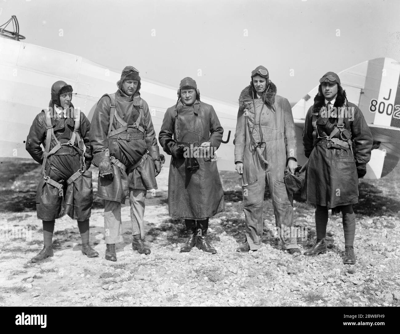 The aerial visitors , RAF bombers , start on peaceful tour from Netheravon . Left to right , Pilot Officer P de Festing Smith , Flt Lt J Whitford , Wing Commander J H A Landon , DSO , O B E Flt Lt W Yool , and Pilot Officer F Freebody . 20 April 1927 Stock Photo