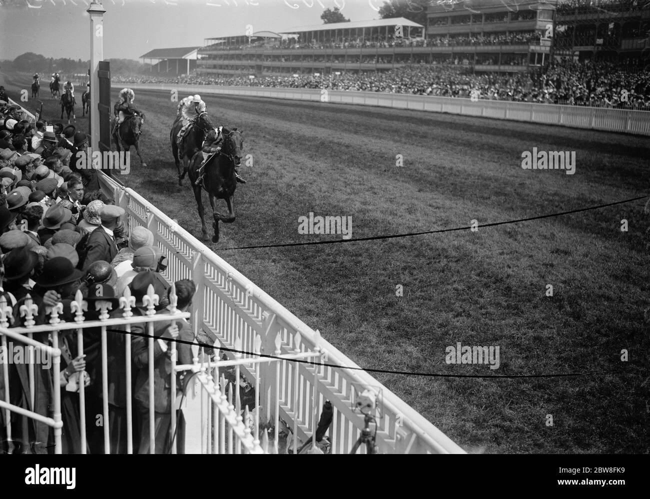 Gold Cup Race at Ascot . Brig Gen Charles Lambton 's  Trimdon  won the Gold Cup Race with Salmon Leap second and Ut Majeur third . J Childs rode the winner . The finish of the race . 16 June 1932 Stock Photo