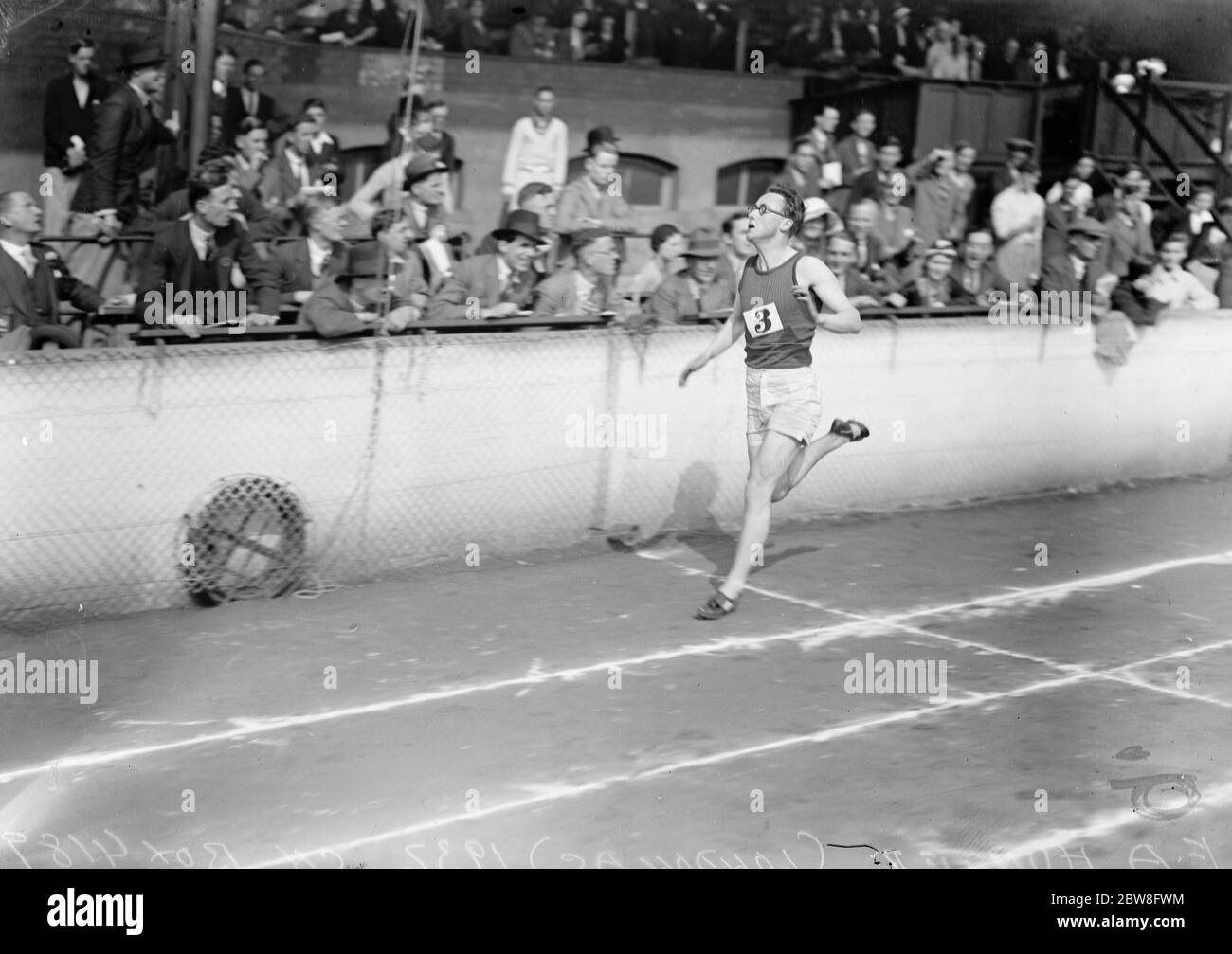 AAA Junior championship at Stamford Bridge . F A Hunter ( London AC ) wins the final of the 220 yards at Stamford Bridge . 25 June 1932 . Stock Photo