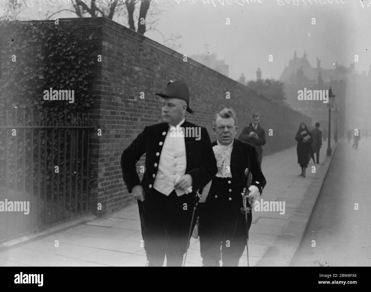 The King holds a levee at St James 's Palace . Sir Henry Jackson and Mr Arthur Robinson , leaving . 24 March 1931 Stock Photo