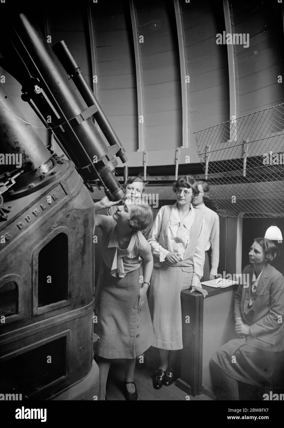 What the Queen will see at Bedford College . When the Queen opens the fine extension to Bedford College on June 24 , she will see one of the few observatories possessed by a woman ' s college . The Students during astronomical studies . 26 May 1931 Stock Photo
